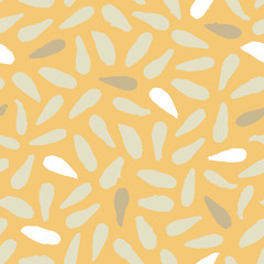 Seamless pattern with seeds and grains. White and beige on a yellow background. Hand drawn. Vector illustration.