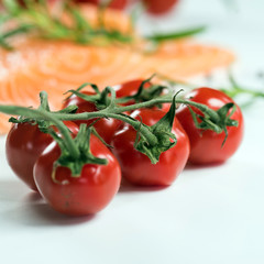 Slices of the fresh salmon on white