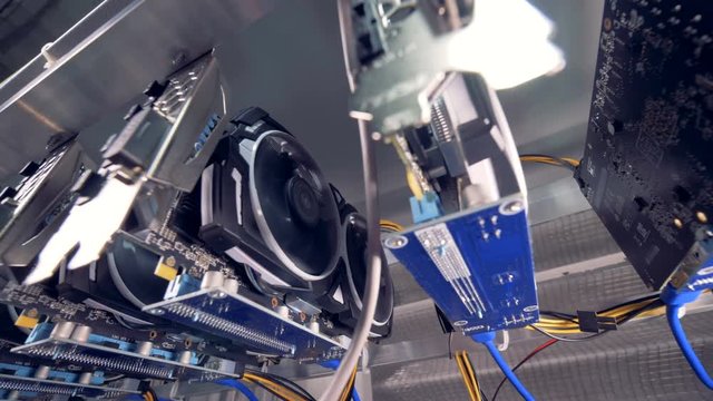 Close up shot of GPU Video Graphics Card mining. Industrial mining farm for bitcoin and cryptocurrency money.