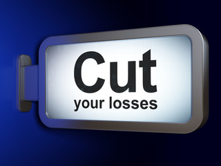 Finance concept: Cut Your losses on advertising billboard background, 3D rendering