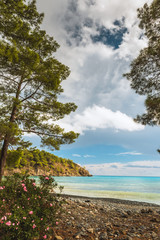 Fototapeta na wymiar Beach at Mediterranean sea. Antalya, Turkey