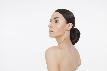 Obraz premium Skin care concept. Beauty and spa for body and face. Beautiful smiling tender young woman with fresh clean skin on white backgroung. Woman health life