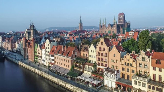 Gdansk, Poland. Aerial 4K flyby video of old city, Motlawa river and famous monuments: Gothic St Mary church, city hall tower, the oldest medieval port crane (Zuraw) and old houses
