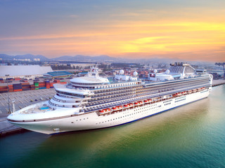 passenger cruise ship stay in port terminal for transfer passenger on board traveling aroung the...