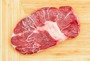Sirloin steak beef meat closeup on wood table