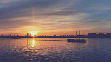 Obraz premium Pleasure boat on the Neva river in St. Petersburg, Russia