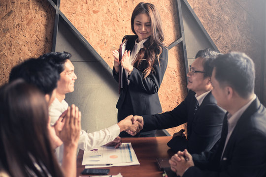 congraturation concept of partner succession of contract business ; business handshaking process after successful deal of business meeting.