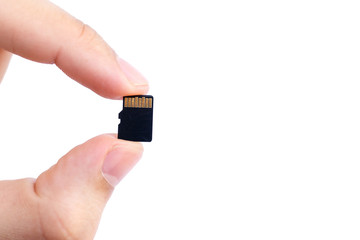 Small Flash card in hand isolated on white background.