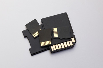 various sizes SD cards on a white background