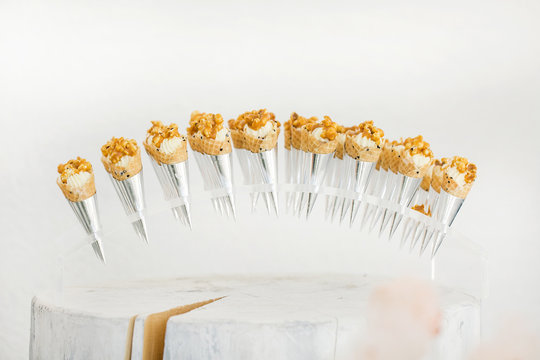 Desserts over white background with flowers