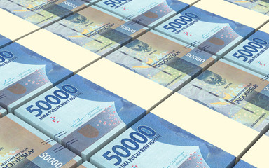 Indonesian rupiah bills stacks background. 3D illustration.