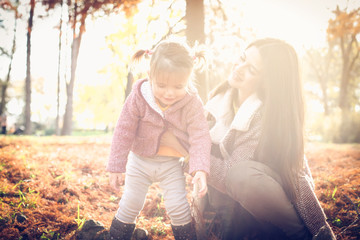 Cheerful mother and little girl.