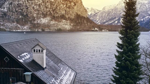 Tranquil scene of house by water in alpine fjord