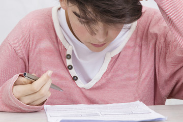 Naklejka premium young studying at the desk, teenagers and children