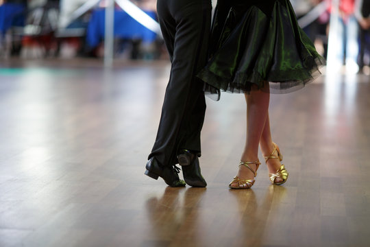Closeup of dancer's legs as they do the ballroom dance
