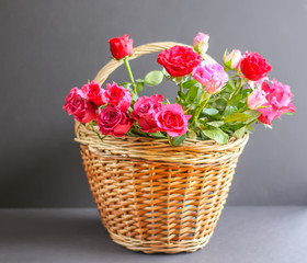 Fototapeta na wymiar Beautiful pink and red in a basket.