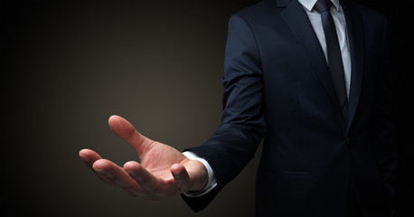 Businessman without head holding something without theme