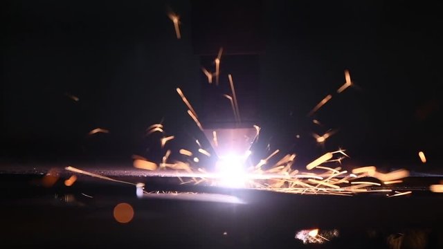 Laser or plasma cutting technology of flat sheet metal. slow motion