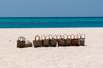 Tradition african straw bags оn the ocean. ready to be sold.