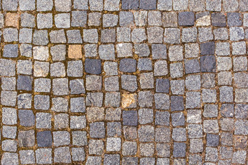 Overhead view of cobblestone street texture.