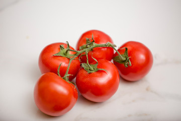 A bunch of isolated tomatoes on white background