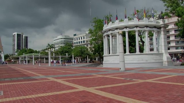 Tourists walk Malecon 2000 towards Monument of Sim&oacute;n Bolivar and San Martin