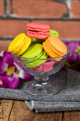 Macaron like flowers placed on the fabric.