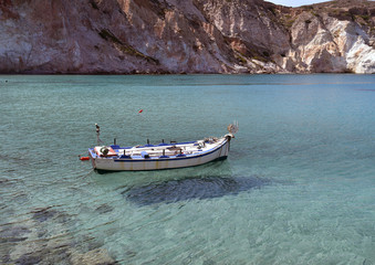 Fototapeta na wymiar Traditional fishing boat on Milos island Greece
