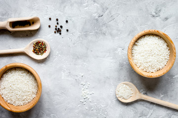 rice for paella on stone background top view mock up
