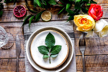 ceramic tableware top view on wooden background mock up