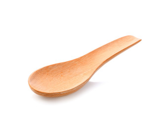 Wooden spoon on white background