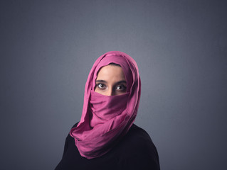 Young muslim woman wearing niqab 
