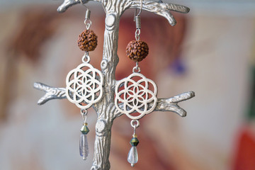 Fashionable gypsy style earrings with natural components