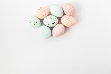 Painting pastel colors eggs.Easter background.Top view.Space for text