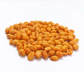 Salted peanuts with red sprinkling on a white background.