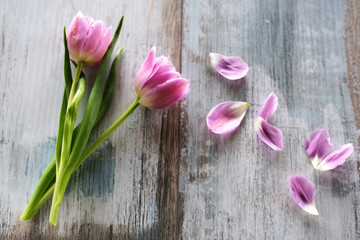 Spring tulips in vintage style on wooden table