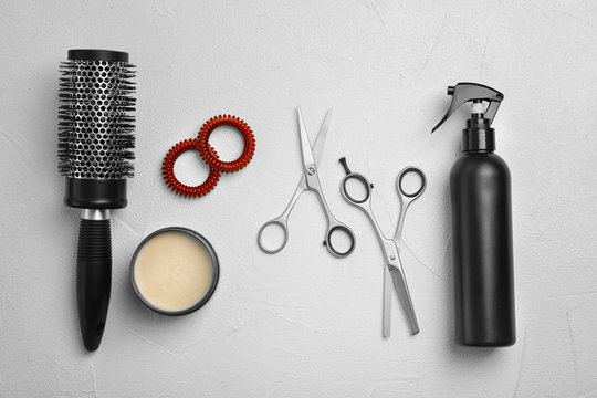 Professional hairdresser set on light background