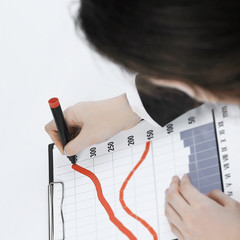 close-up. business woman making a marketing schedule