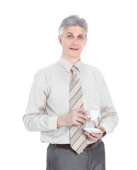 confident businessman with Cup of coffee.isolated on white