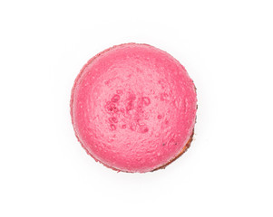 Pink French macaron top view isolated on white background one with raspberry jam.
