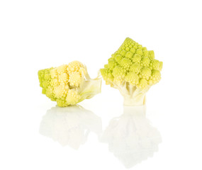 Romanesco cauliflower two green pieces isolated on white background.