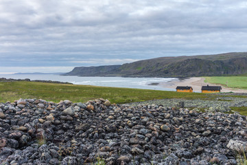Fototapeta na wymiar Stony coast of the Barents Sea along the Varanger National Touri