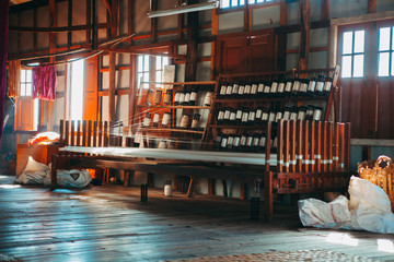Lotus weaving shuttle on an old manual weaving machine