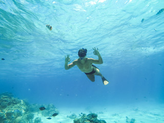 Bora Bora, French Polynesia. Snorkeling in turquoise waters.