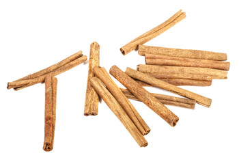 Cinnamon stick isolated on white background. Close-up.