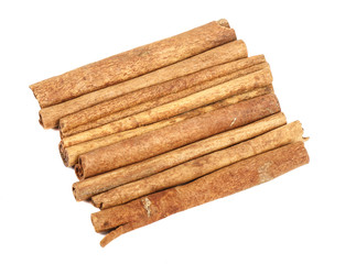 Cinnamon stick isolated on white background. Close-up.