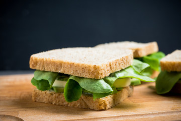 Sandwich avocado, salad and mozzarella. Selective focus.