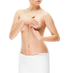 Fototapeta premium Woman examining breast isolated on white background