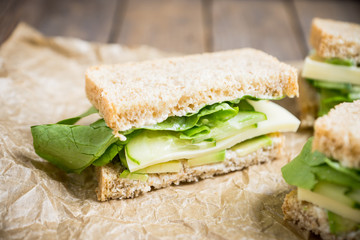 Sandwich avocado, salad and mozzarella. Selective focus.