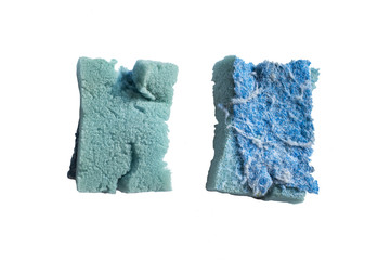 Used dishwashing sponge isolated on white background
